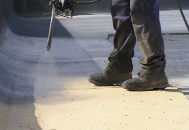 Coating systems over Downey spray foam roof systems